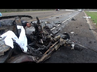 010122 PASSENGER CAR HITS 18 WHEELER AND BURSTS INTO FLAMES KILLING THE DRIVER