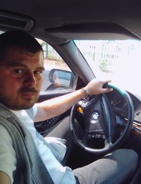 Олег Греков